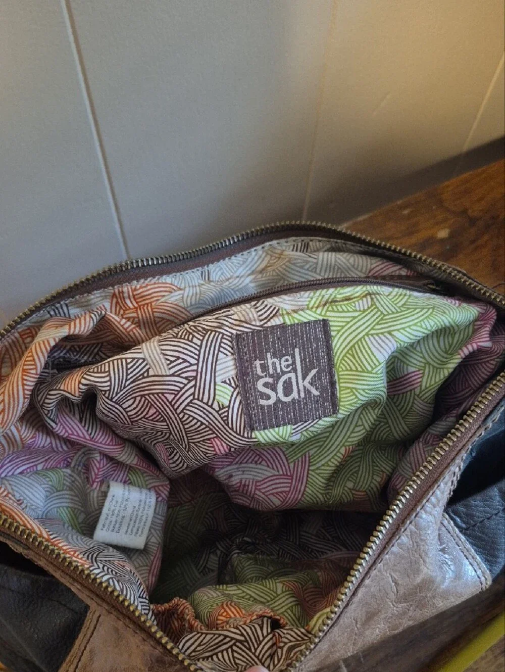 The Sak Two-Tone Brown and Black Leather Messenger Bag